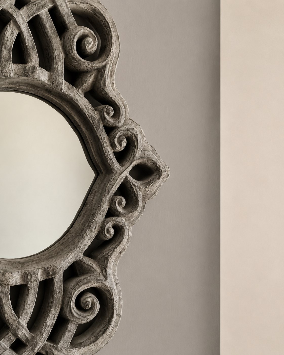 Close detail of the carved mirror frame