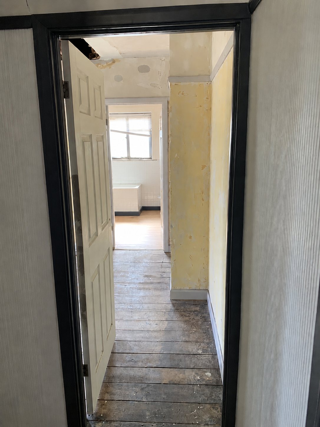 The original bathroom access before the first-floor layout was reconfigured