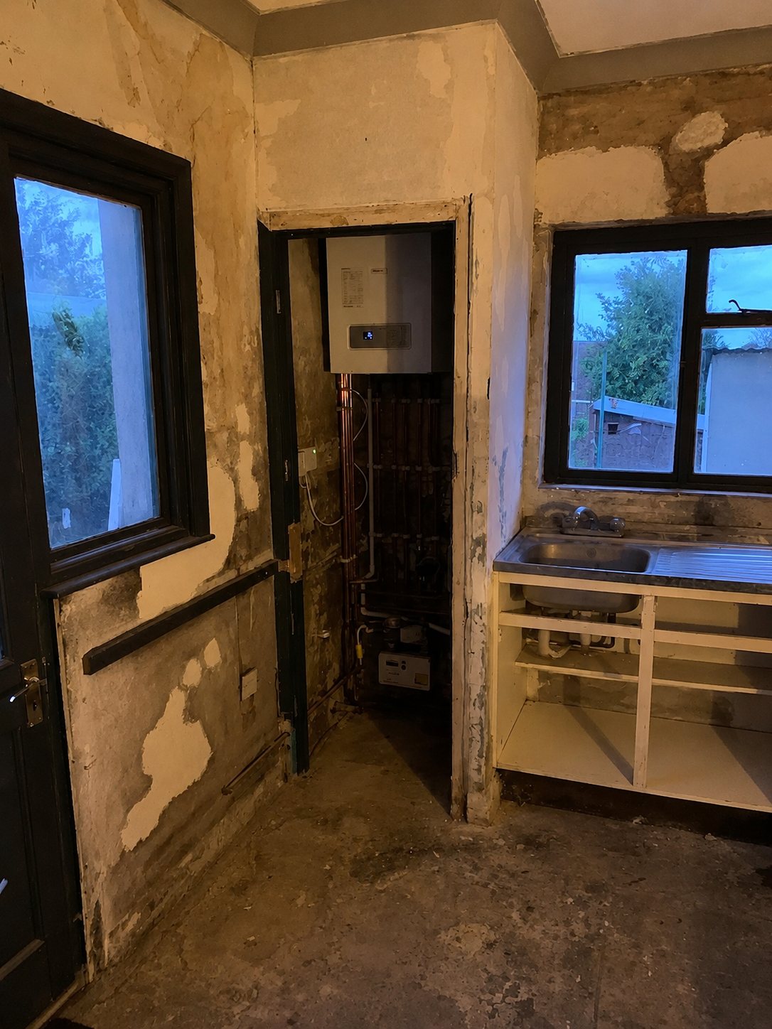 The original kitchen stripped back during the building works