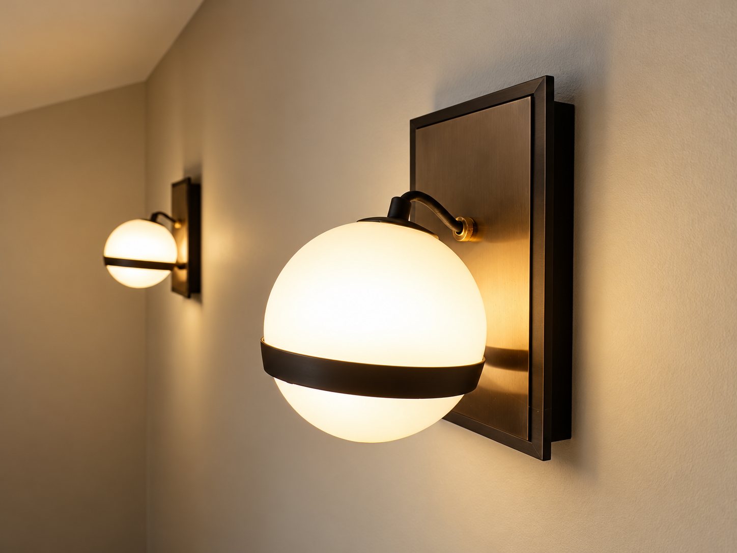 Art Deco globe wall lights on the staircase wall